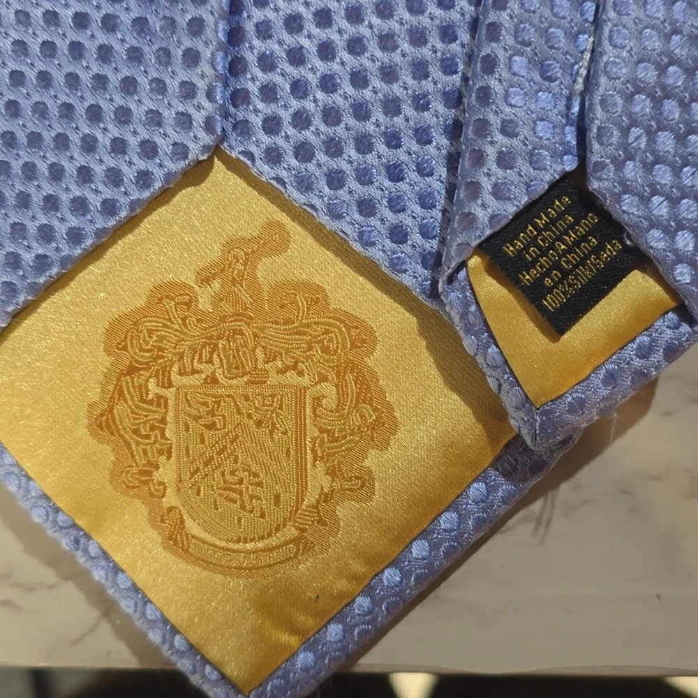 Sophisticated Light Blue Textured Tie By Donald Trump